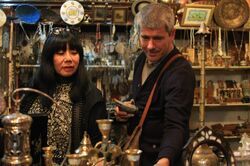 Фото Man Shops Globe